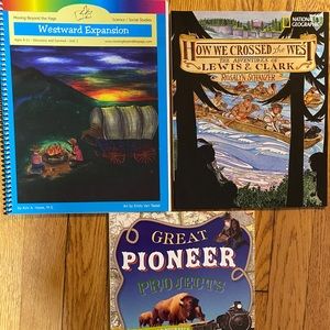 Homeschooling books and coordinating workbook.
